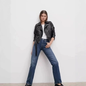 Veste de moto en similicuir noir pour femme avec revers et ceinture, style décontracté
