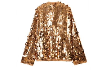 Detailed close-up of golden sequin jacket with metallic shine and raw hem edges