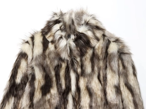 Detailed macro view of high-quality faux fur material with black and white stripes