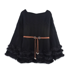 Off-shoulder black knit sweater with faux fur trim and fringed belt detailing