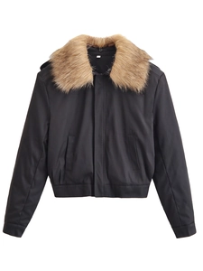 Detail showing the fluffy brown faux fur collar and black bomber jacket ribbed hem