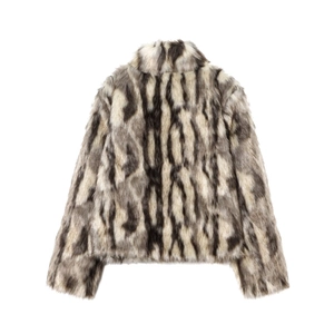 Rear view of a fluffy faux fur coat with vertical grey white and black patterns
