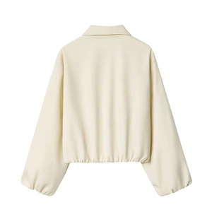 Back view of cream-colored short jacket featuring a classic collar and elastic peplum hem