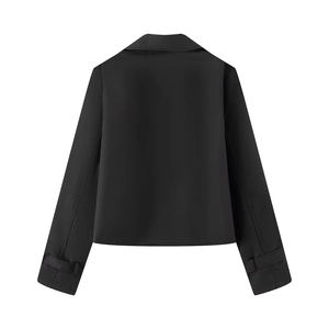Rear view of black short trench jacket showing classic collar and buckled sleeve cuffs
