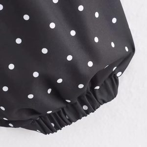 Giacca ampia da donna a pois neri con zip e dettaglio bordo elasticizzato