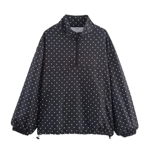 Giacca a vento donna nera a pois con mezza zip, collo alto e orlo regolabile con coulisse