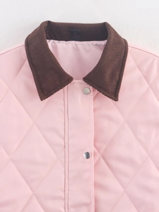 Detail of pink quilted jacket with contrast brown corduroy collar and silver snap buttons