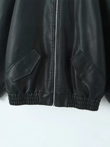 Veste baseball rétro ample en cuir noir avec fermeture éclair argentée et ourlet côtelé