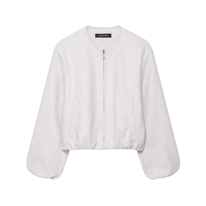 Detailed view of the light grey bomber jacket featuring silver zipper and wool texture