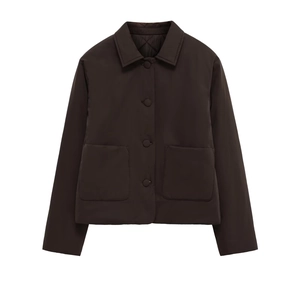 Detailed view of deep brown faux suede jacket with classic collar and front pockets