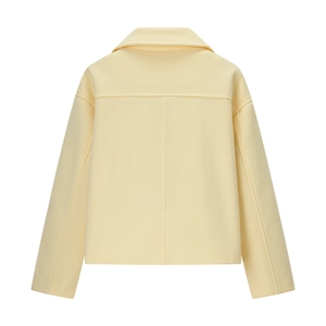 Vue arrière détaillée d'une veste courte jaune en laine avec coutures de structure nettes