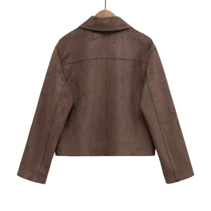 Detailed back view of a brown suede jacket featuring center seam and vintage texture