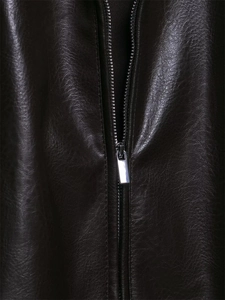 Close-up of vintage brown faux leather jacket featuring silver metal zipper and pebble grain texture