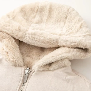 Elegant off-white faux fur hooded jacket with silver zipper and suede texture details