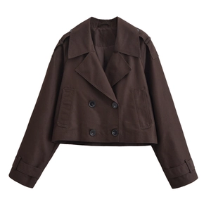 Detail view of dark brown cropped jacket with shoulder epaulets and double-breasted buttons