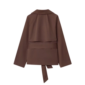 Back view of mocha brown cropped trench coat with storm flap and fabric belted waist