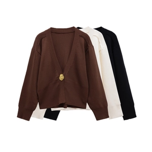 Women's V-neck knit cardigan sweater with gold button in brown, white and black colors