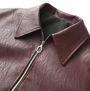 Fashionable dark wine red faux leather jacket with classic lapel and metallic zipper