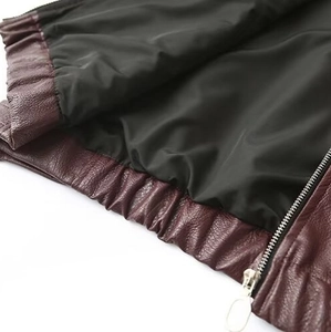 Classic wine red leather jacket featuring elastic hem and premium silver metal zipper detail