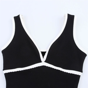 Elegant knit V-neck sleeveless dress with white wavy trim and black contrast design