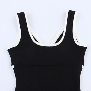 Women's black knit tank top with white scalloped trim and U-neckline detail