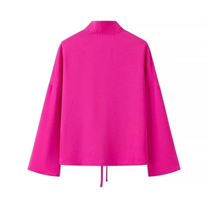 Detail view of pink long sleeve shirt with drawstring hem and stand collar back