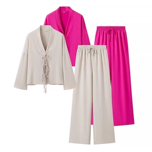 Women's two-piece lounge set with tie-front long sleeve top and wide-leg drawstring pants