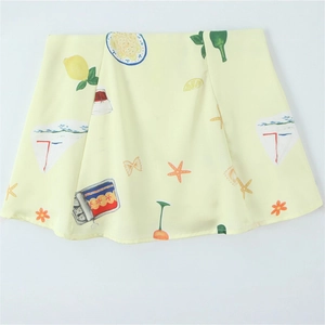 Pale yellow satin A-line mini skirt featuring creative Mediterranean illustration prints