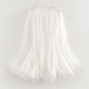 Elegant white long sleeve dress with layered ruffle hem and minimalist crew neck