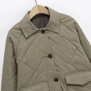 Olive quilted casual jacket with diamond patterns, shirt collar and front pockets