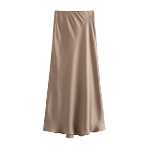 Detailed view of champagne satin high waist maxi skirt with smooth glossy texture