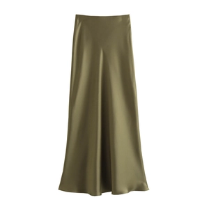 Detailed view of olive green satin midi skirt showing smooth silk texture and drape