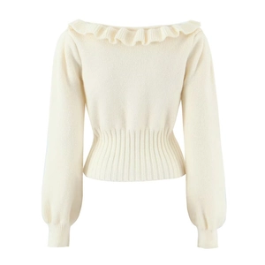Elegant cream knit sweater featuring a ruffled round neckline and stylish ribbon bow detail