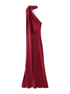 Detail of dark red satin dress with halter neck, flowing streamers and waist cutout