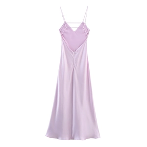 Detail of lavender satin dress featuring cross-strap open back and invisible zipper