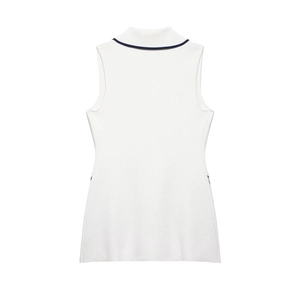 Detail of white sleeveless knitted top with navy blue contrast trim on the collar