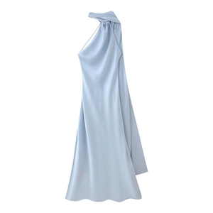 Detail of light blue satin dress featuring an asymmetrical halter neckline with elegant draping
