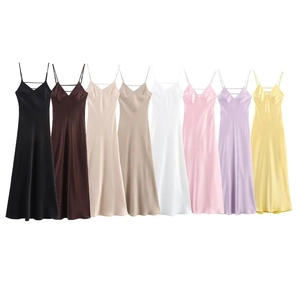 Elegant satin slip maxi dress for women featuring a V-neck and delicate cross-strap details