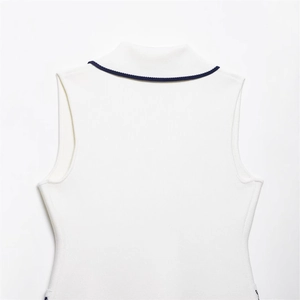 Women's chic sleeveless knit top in off-white with navy blue trim and textured fabric