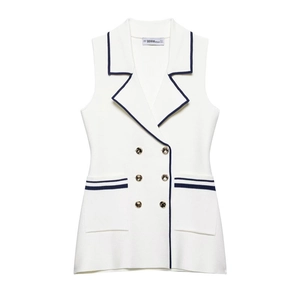 Women's cream knit vest featuring a contrast navy trim and gold double-breasted buttons