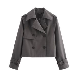 Detail of dark grey cropped trench coat with lapel collar, epaulettes and double-breasted buttons