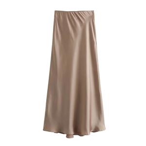 Detailed view of high-waist champagne satin midi skirt with silky glossy texture