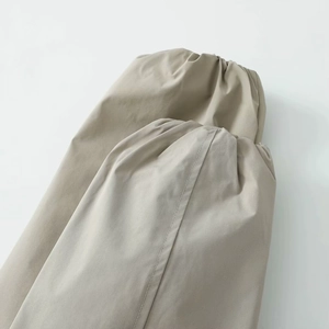 Close-up of elastic ribbed cuff on khaki autumn jacket made of high-quality woven fabric
