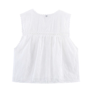 Detailed view of white cotton vest with bohemian floral embroidery and lace trim textures