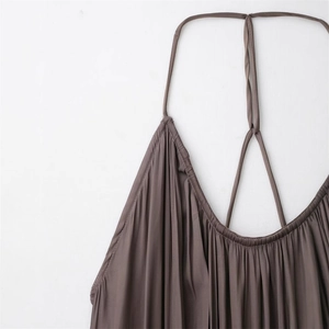 Slim-fit dark brown pleated strap dress with minimalist cross-back detail and soft texture