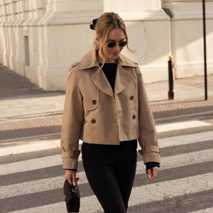 Classic khaki double-breasted short trench coat with lapels and cuff straps for women