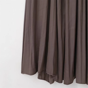 Deep coffee pleated slim fit dress with elegant vertical accordion folds and hem details
