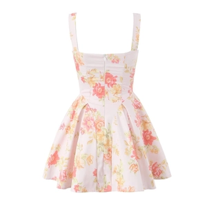 Detail view of pink floral sundress back showing A-line silhouette and hidden zipper