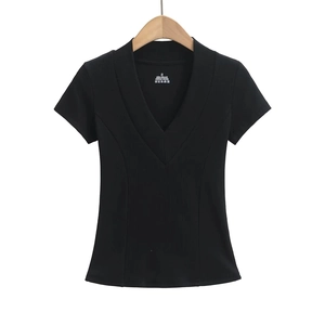 Detailed view of deep V-neckline and ribbed texture on slim fit black short sleeve t-shirt