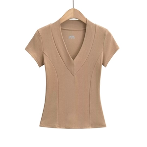 Close-up of khaki deep V-neck short sleeve T-shirt featuring vertical ribbed texture